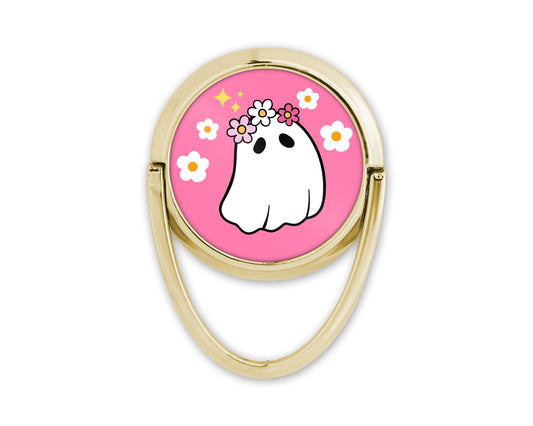 Glissez votre doigt dans cette boucle dorée, et laissez votre téléphone devenir votre accessoire préféré. Une manière fun et chic d'exprimer votre personnalité à chaque appel, message, ou selfie.