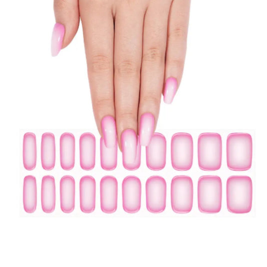 Manucure rose dégradée effet ombré, réalisée avec des stickers gel semi-permanent Emano Pinkora – pour un look doux et élégant à la maison.